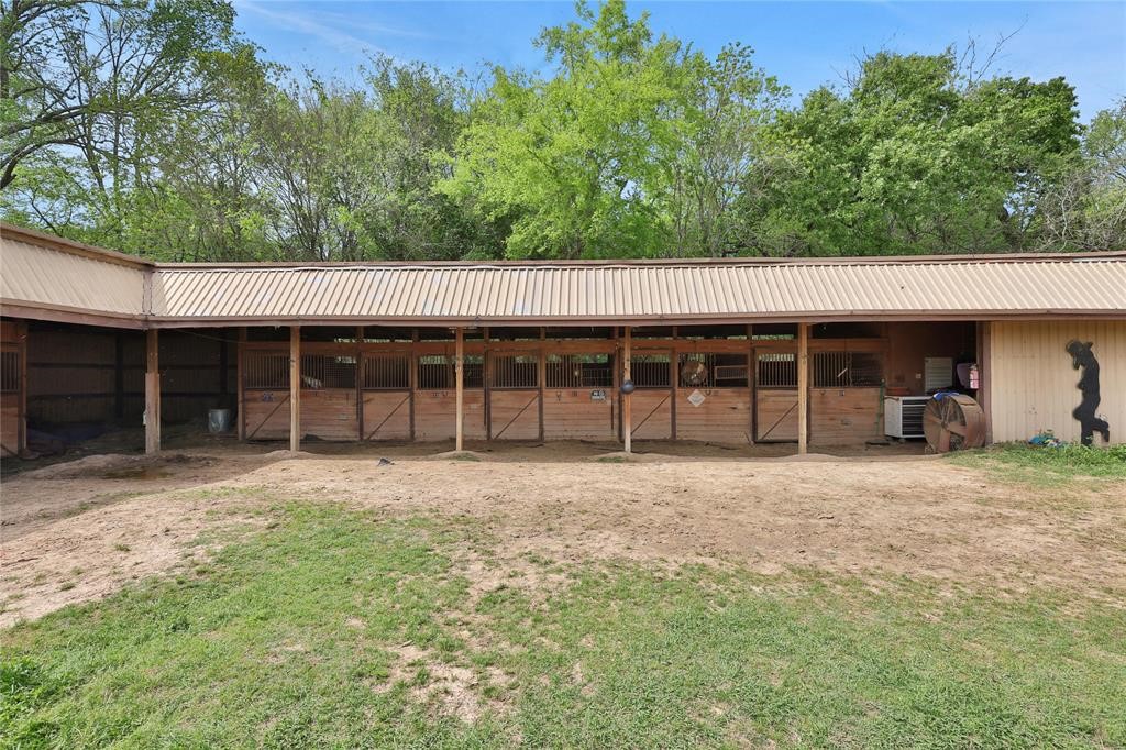 11350 Grant Road Cypress, TX 77429 - Photo 21 of 41 front view of a house with a garden
