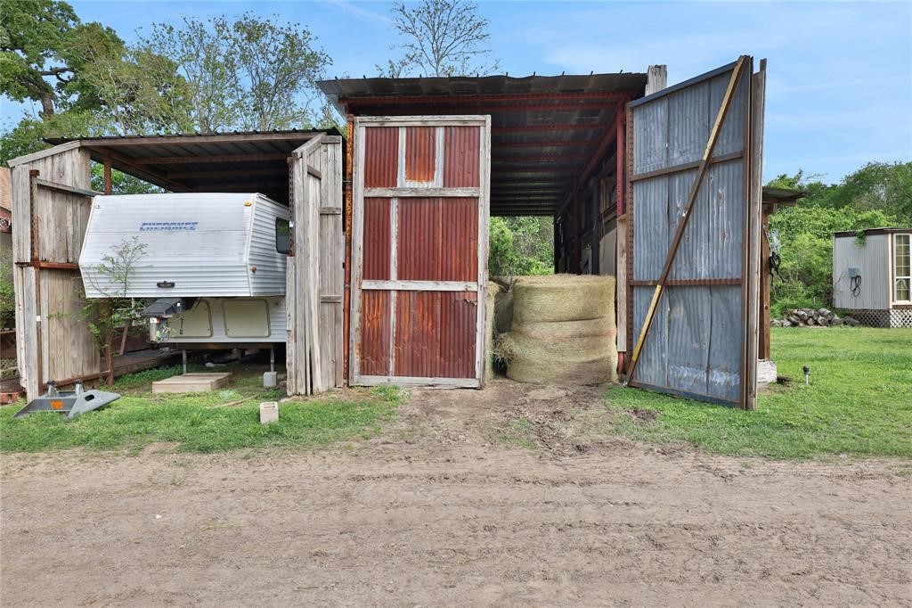 11350 Grant Road Cypress, TX 77429 - Photo 27 of 41 a backyard of a house with table and chairs