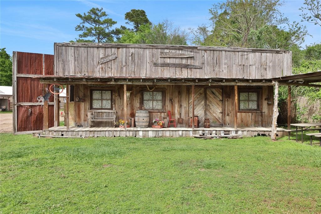 11350 Grant Road Cypress, TX 77429 - Photo 28 of 41 a view of a house with backyard and sitting area
