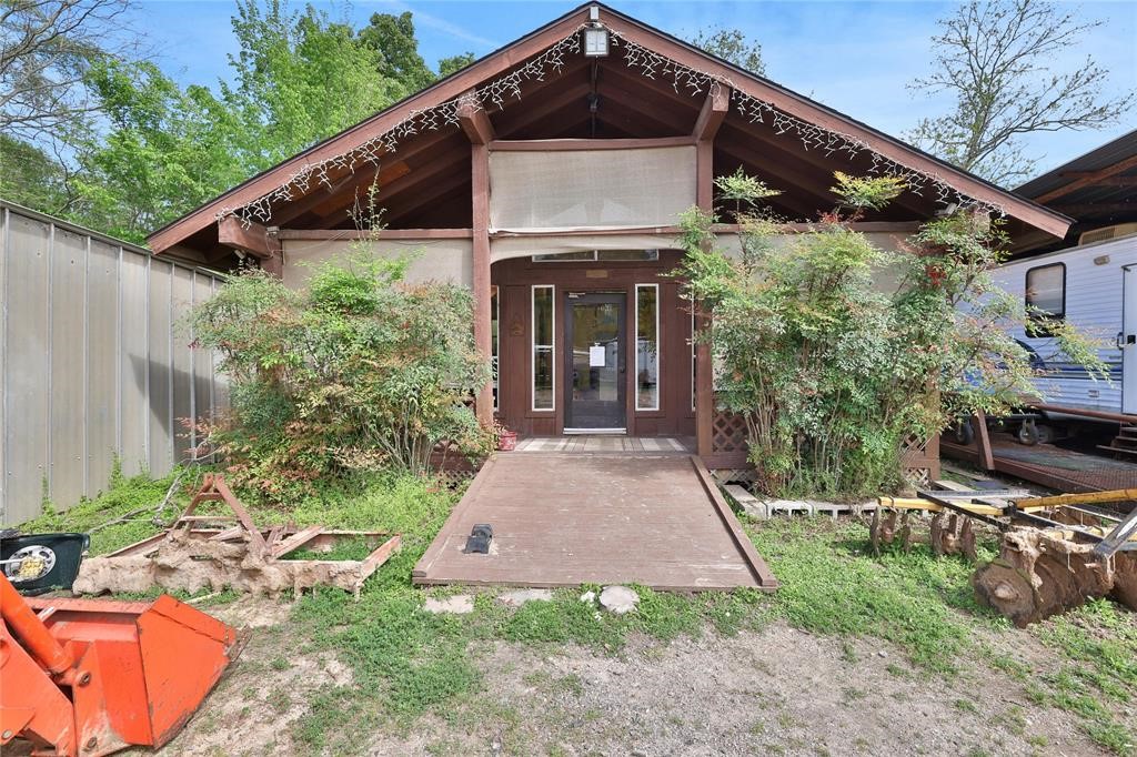 11350 Grant Road Cypress, TX 77429 - Photo 29 of 41 a front view of a house with garden
