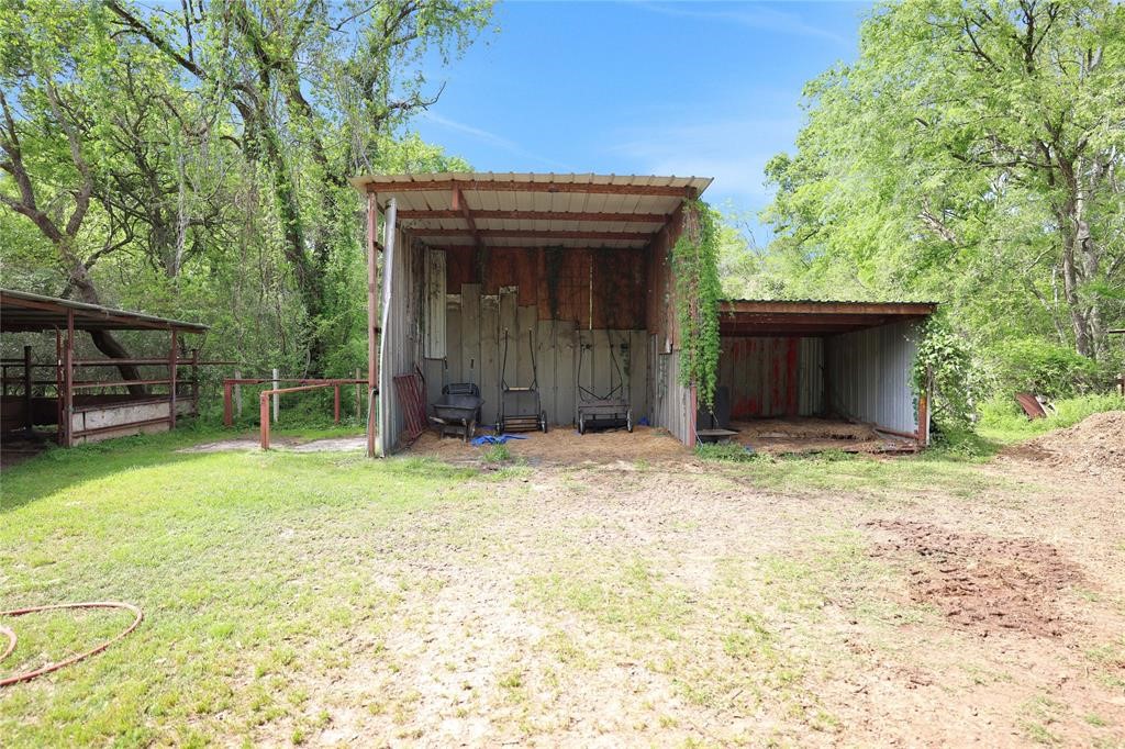 11350 Grant Road Cypress, TX 77429 - Photo 37 of 41 a view of a backyard with a garden