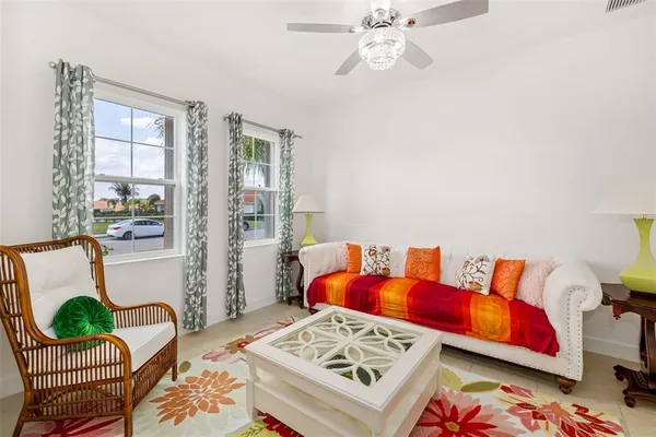 a living room with furniture and a window