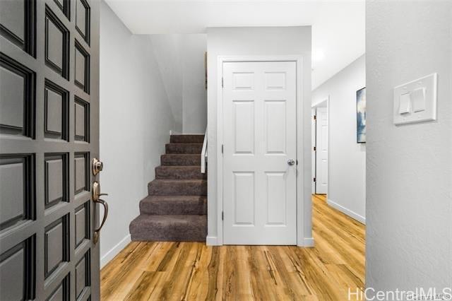 47-261 Hui Iwa Street, Unit 64 Kaneohe, HI 96744 - Photo 11 of 21 a view of entryway with wooden floor
