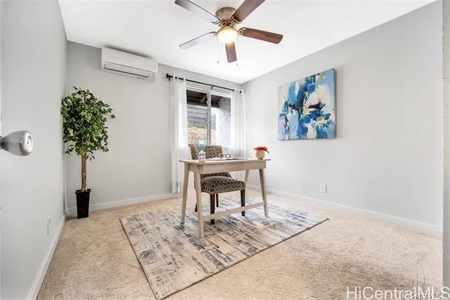 a workspace with furniture and window