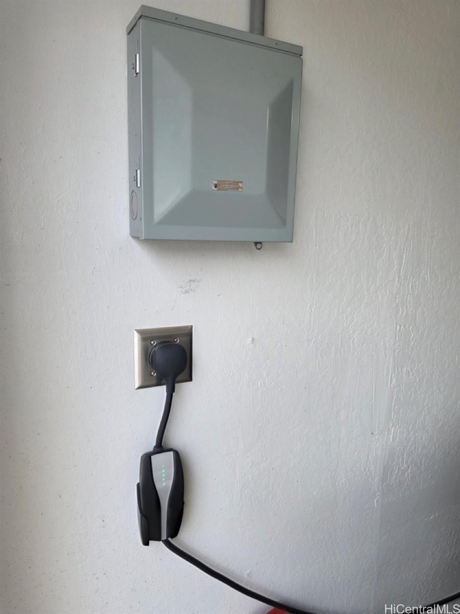 47-261 Hui Iwa Street, Unit 64 Kaneohe, HI 96744 - Photo 21 of 21 a bathroom with a sink and a mirror