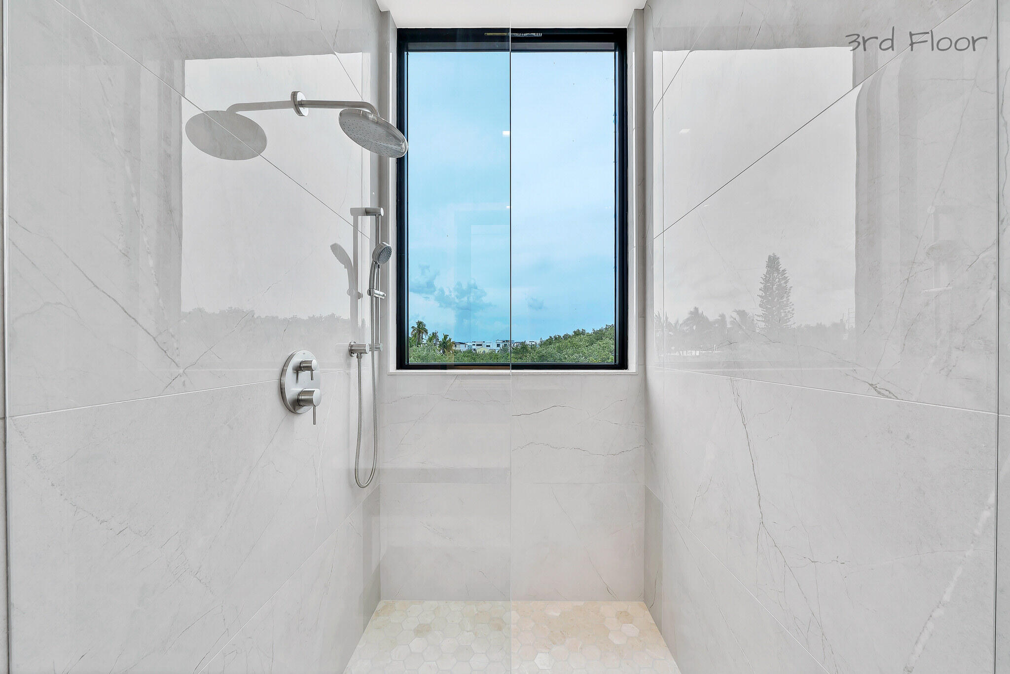 16 Seaside Avenue Key Largo, FL 33037 - Photo 109 of 140 a bathroom with a glass shower door