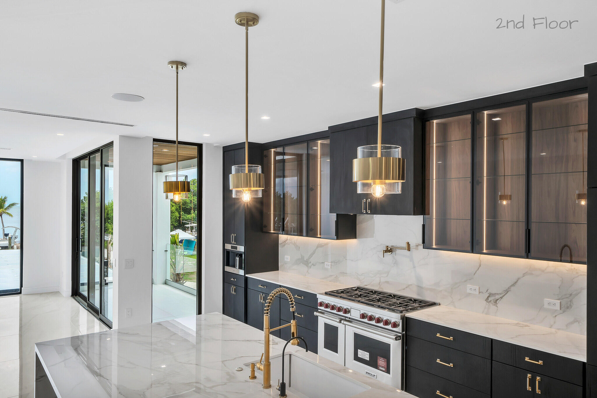 16 Seaside Avenue Key Largo, FL 33037 - Photo 18 of 140 a kitchen with stainless steel appliances granite countertop a stove a refrigerator and a sink
