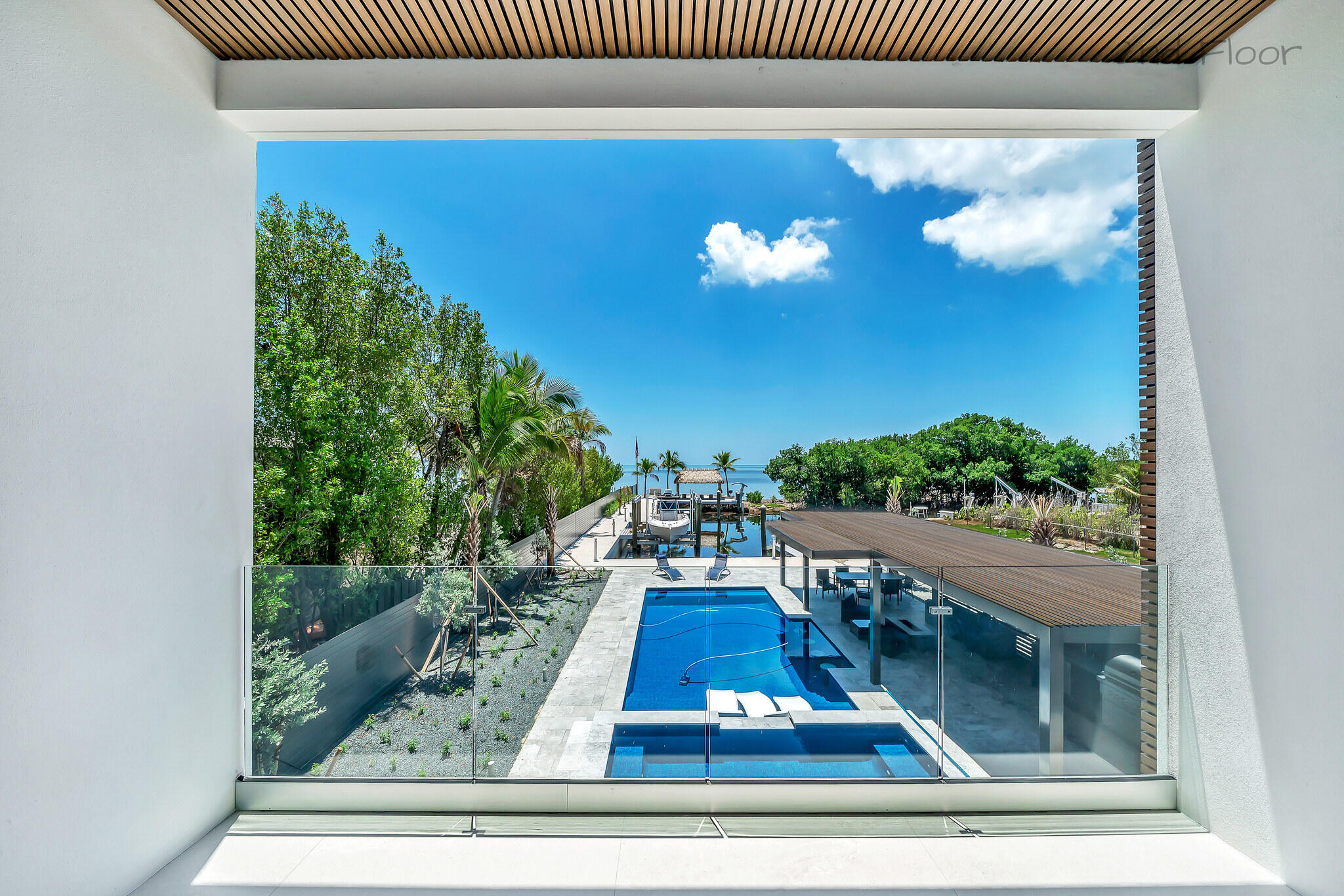 16 Seaside Avenue Key Largo, FL 33037 - Photo 36 of 140 a view of a floor to ceiling window and potted plants