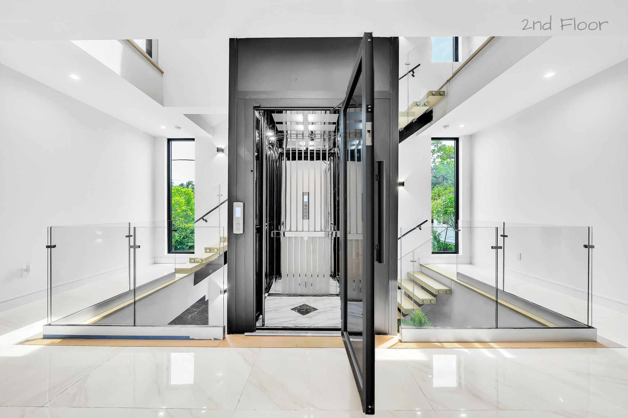 16 Seaside Avenue Key Largo, FL 33037 - Photo 44 of 140 Elevator landing on third level