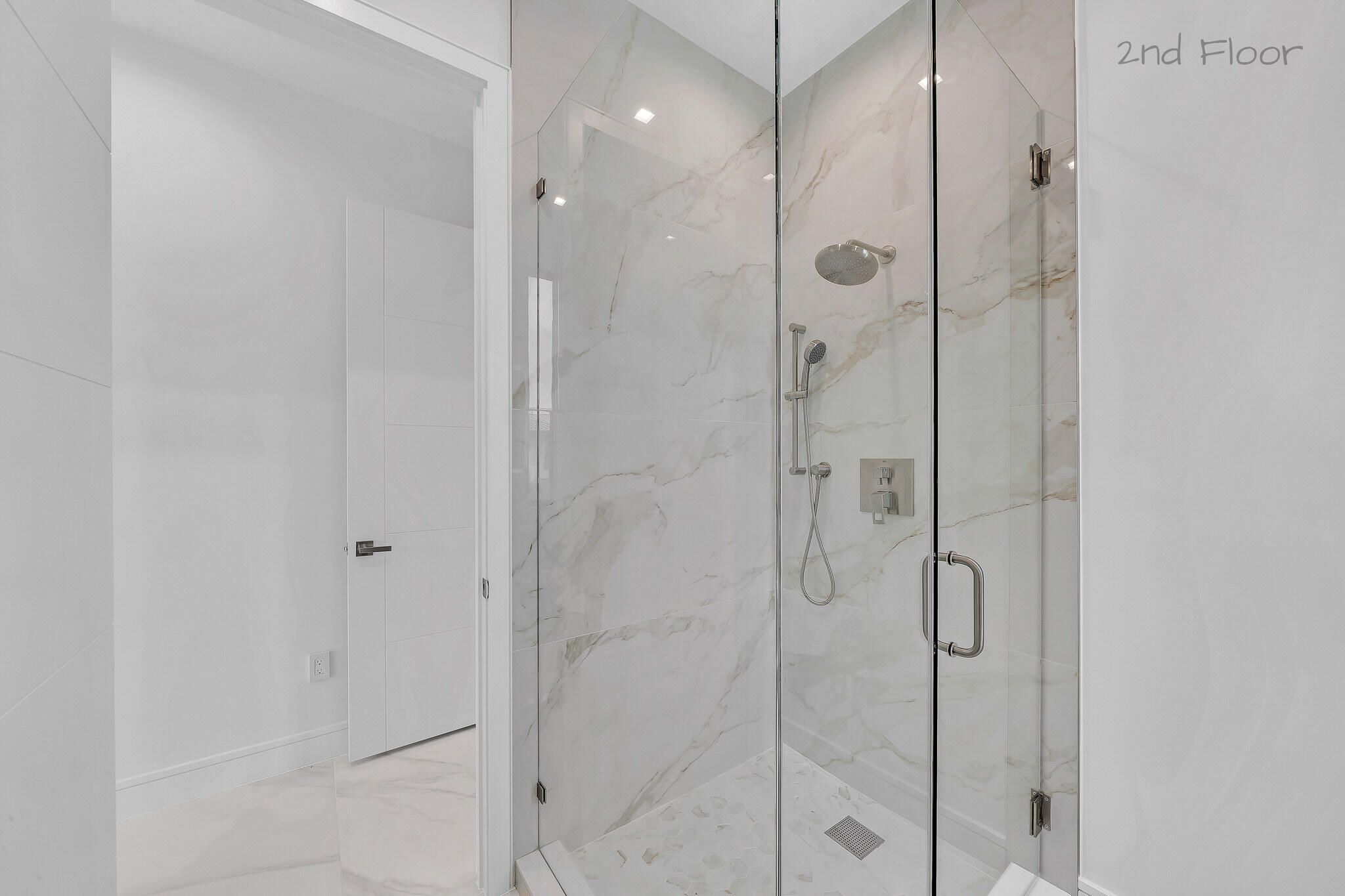 16 Seaside Avenue Key Largo, FL 33037 - Photo 47 of 140 a bathroom with a glass shower door
