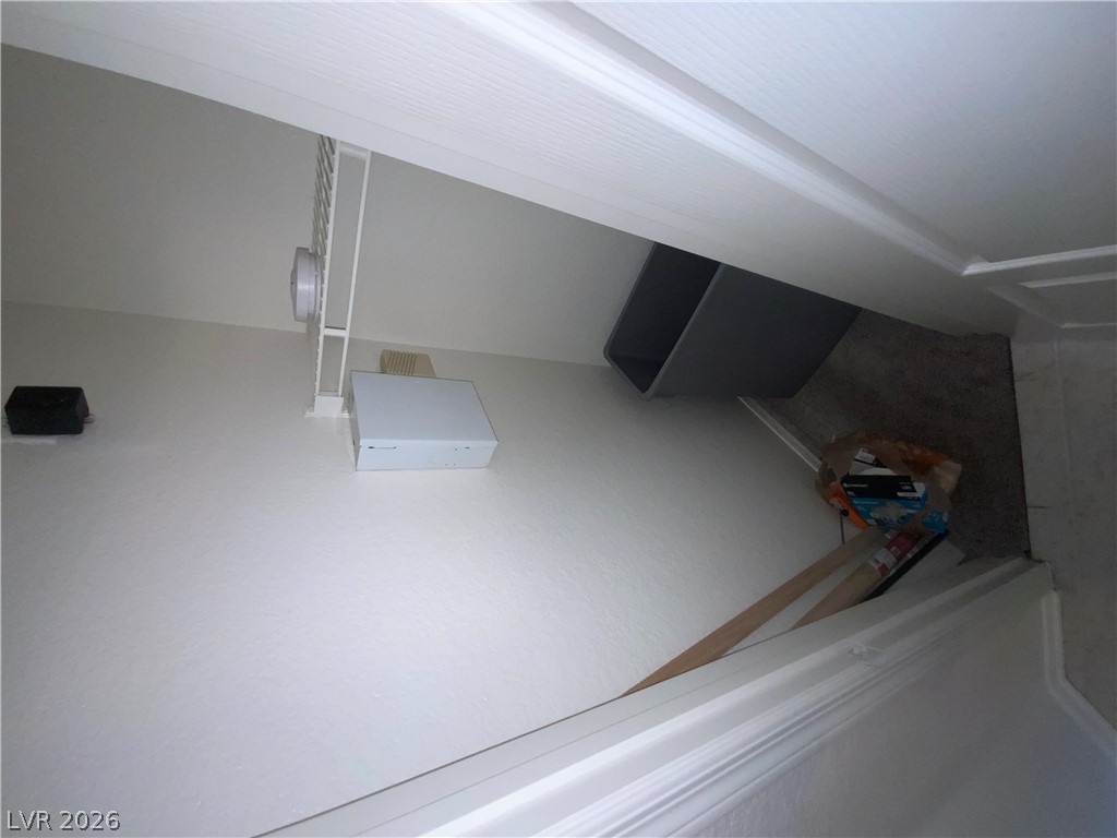 7400 West Flamingo Road, Unit 1039 Las Vegas, NV 89147 - Photo 39 of 40 An attic space featuring a simple vent system and ample storage capacity.