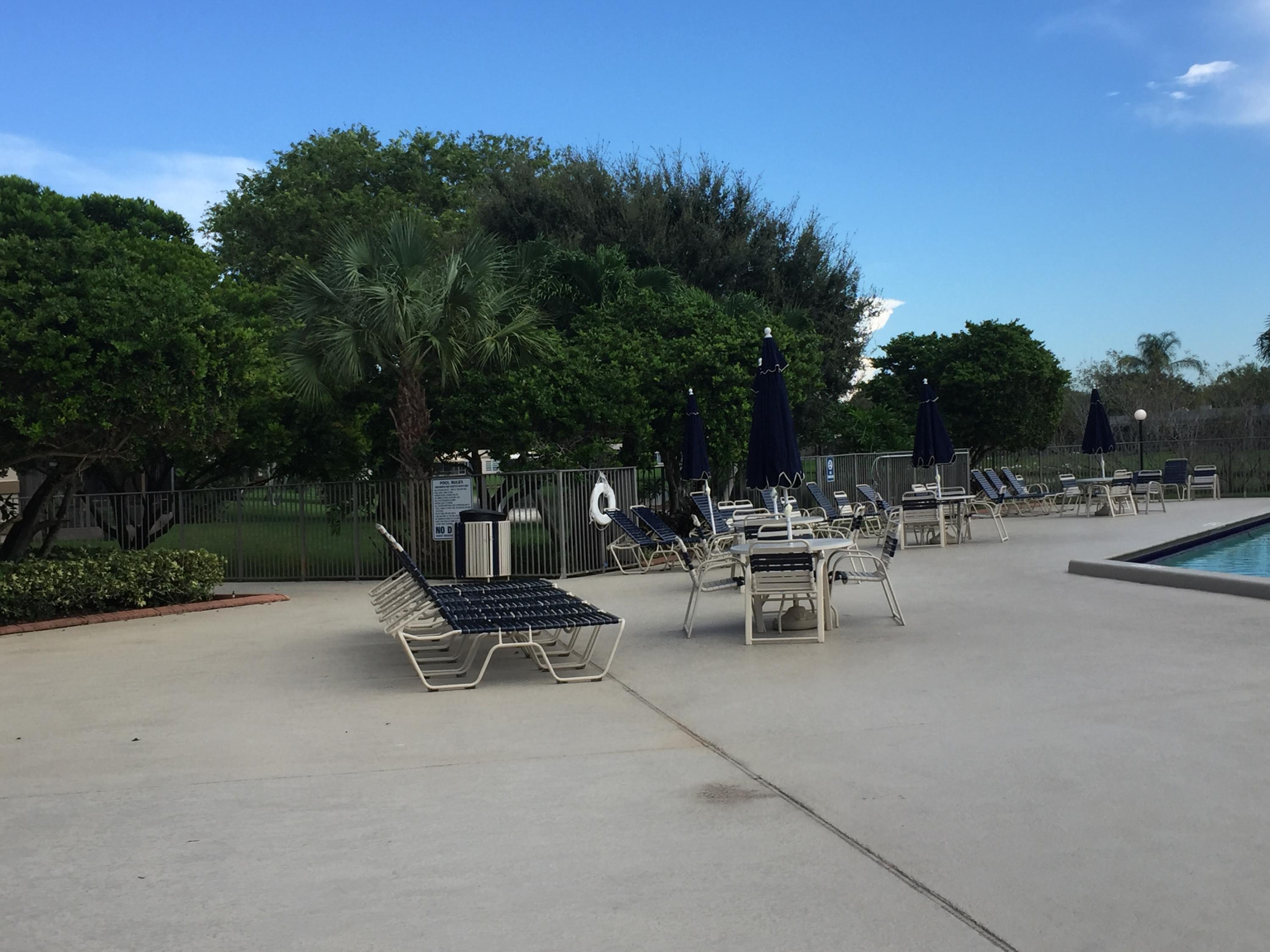 9185 Flynn Circle, Unit 8 Boca Raton, FL 33496 - Photo 12 of 13 Pool area