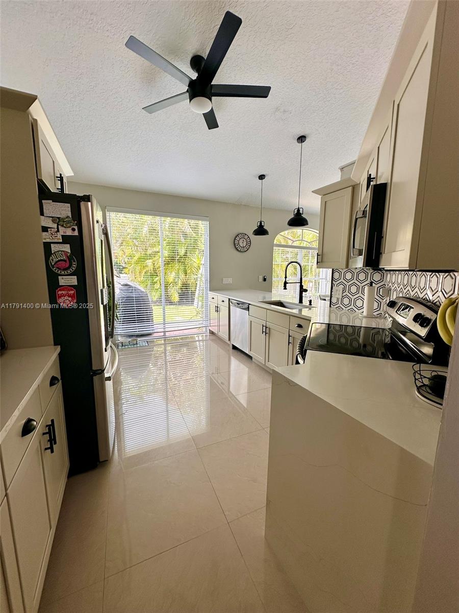 3961 Antigua Point Drive Boca Raton, FL 33487 - Photo 19 of 65 a very nice looking room with a large window