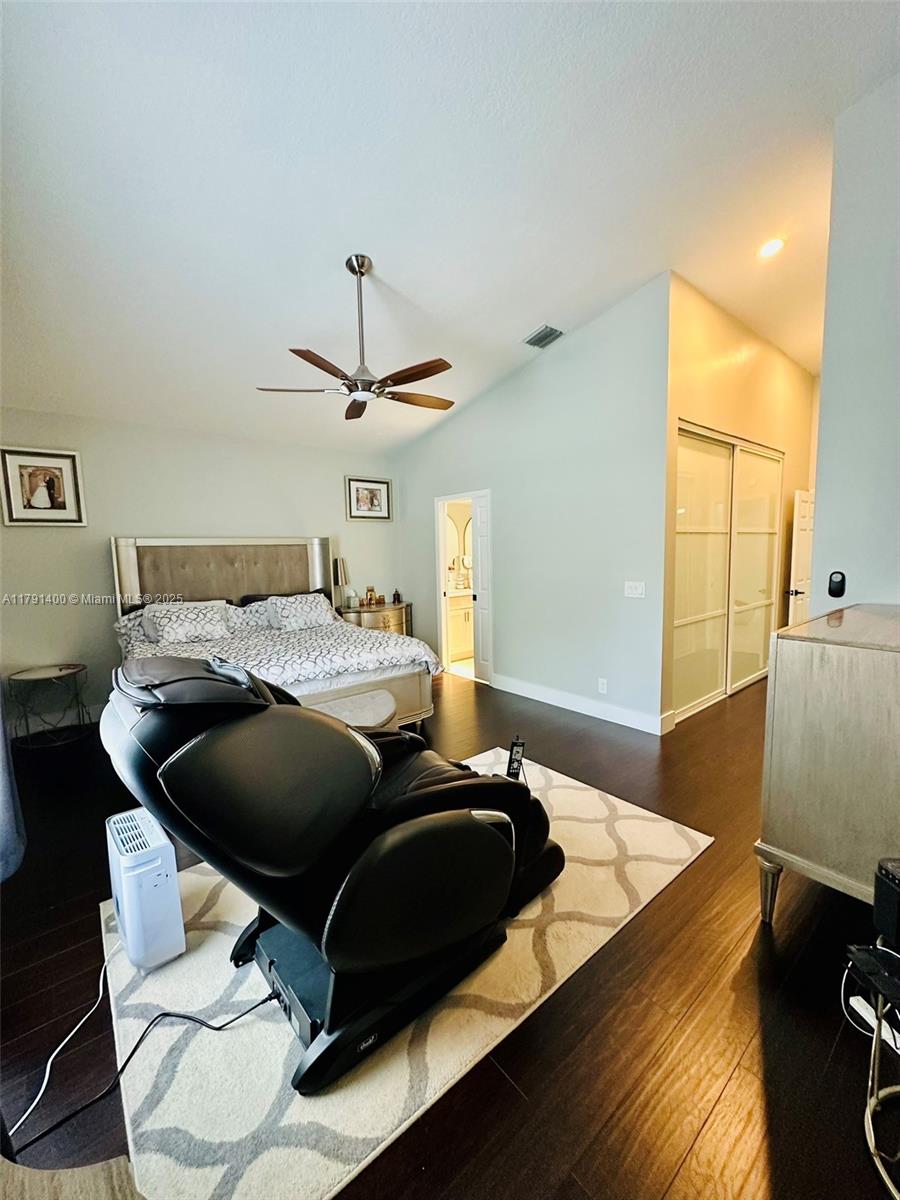 3961 Antigua Point Drive Boca Raton, FL 33487 - Photo 34 of 65 a bed room with a bed and a television