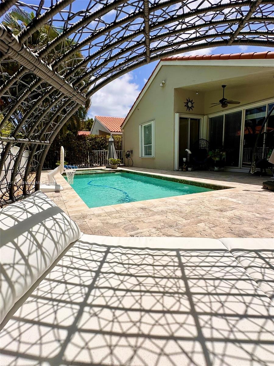 3961 Antigua Point Drive Boca Raton, FL 33487 - Photo 62 of 65 a view of a backyard of the house