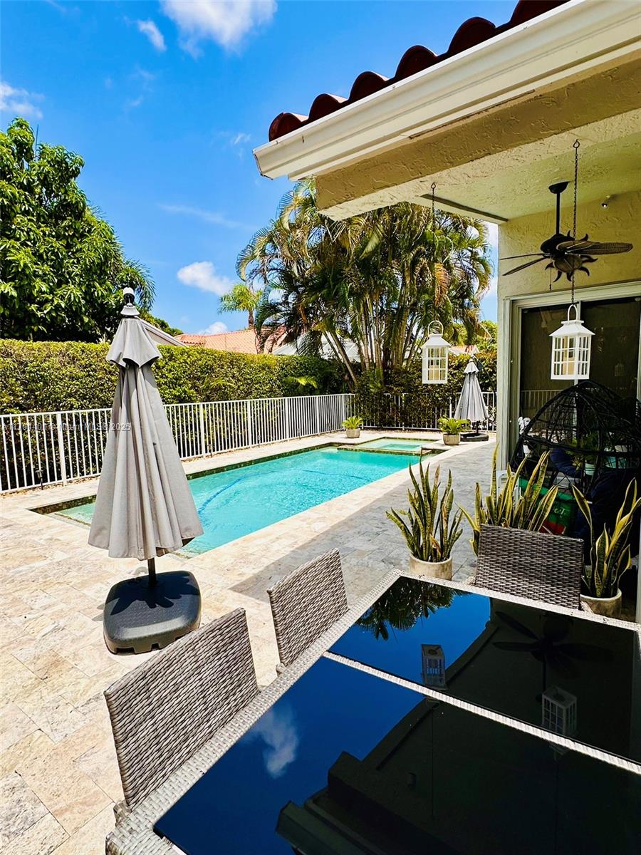 3961 Antigua Point Drive Boca Raton, FL 33487 - Photo 64 of 65 a view of a chairs and table in the patio