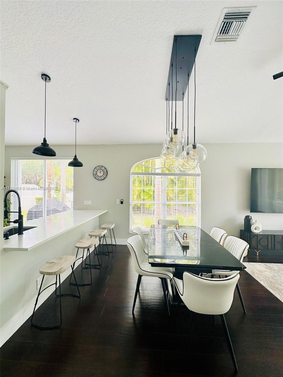3961 Antigua Point Drive Boca Raton, FL 33487 - Photo 8 of 65 a dining room with furniture and window