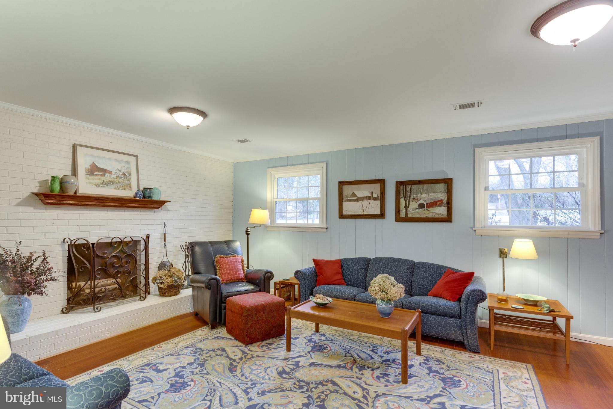 9810 Vale Road Vienna, VA 22181 - Photo 17 of 30 Spacious Family Room with Wood-burning Fireplace