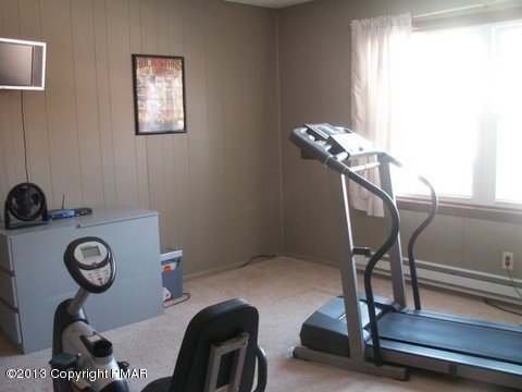 1138 Clover Road Long Pond, PA 18334 - Photo 11 of 23 a view of workspace with wooden floor windows
