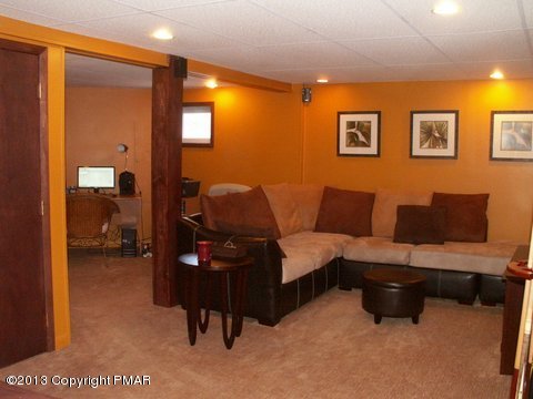 1138 Clover Road Long Pond, PA 18334 - Photo 18 of 23 a living room with furniture and a mirror