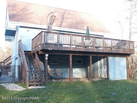 1138 Clover Road Long Pond, PA 18334 - Photo 4 of 23 a view of a house with a balcony