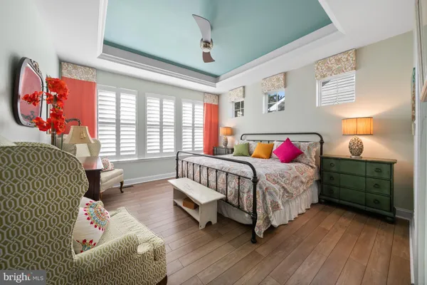 a bedroom with a bed and a couch