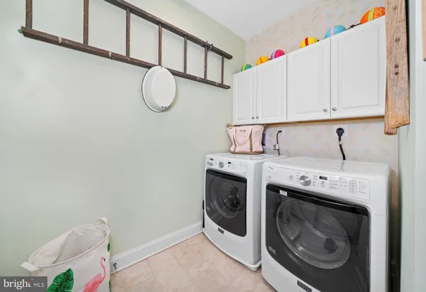 a bathroom with a sink a mirror and a toilet