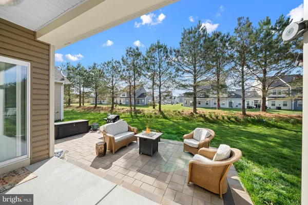 a work room with furniture and wall paintings