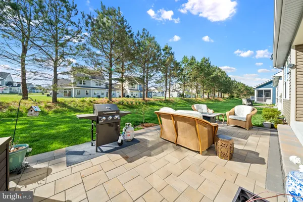 a outdoor space with patio furniture and potted plants