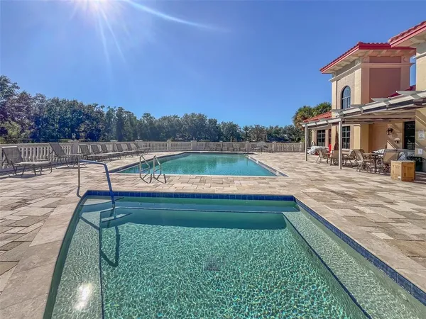 a view of swimming pool with a yard