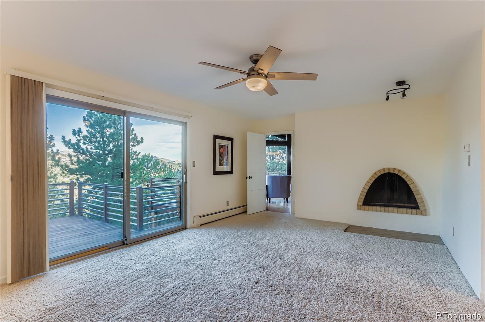 994 Timber Lane Boulder, CO 80304 - Photo 18 of 21 a view of empty room with floor to ceiling window