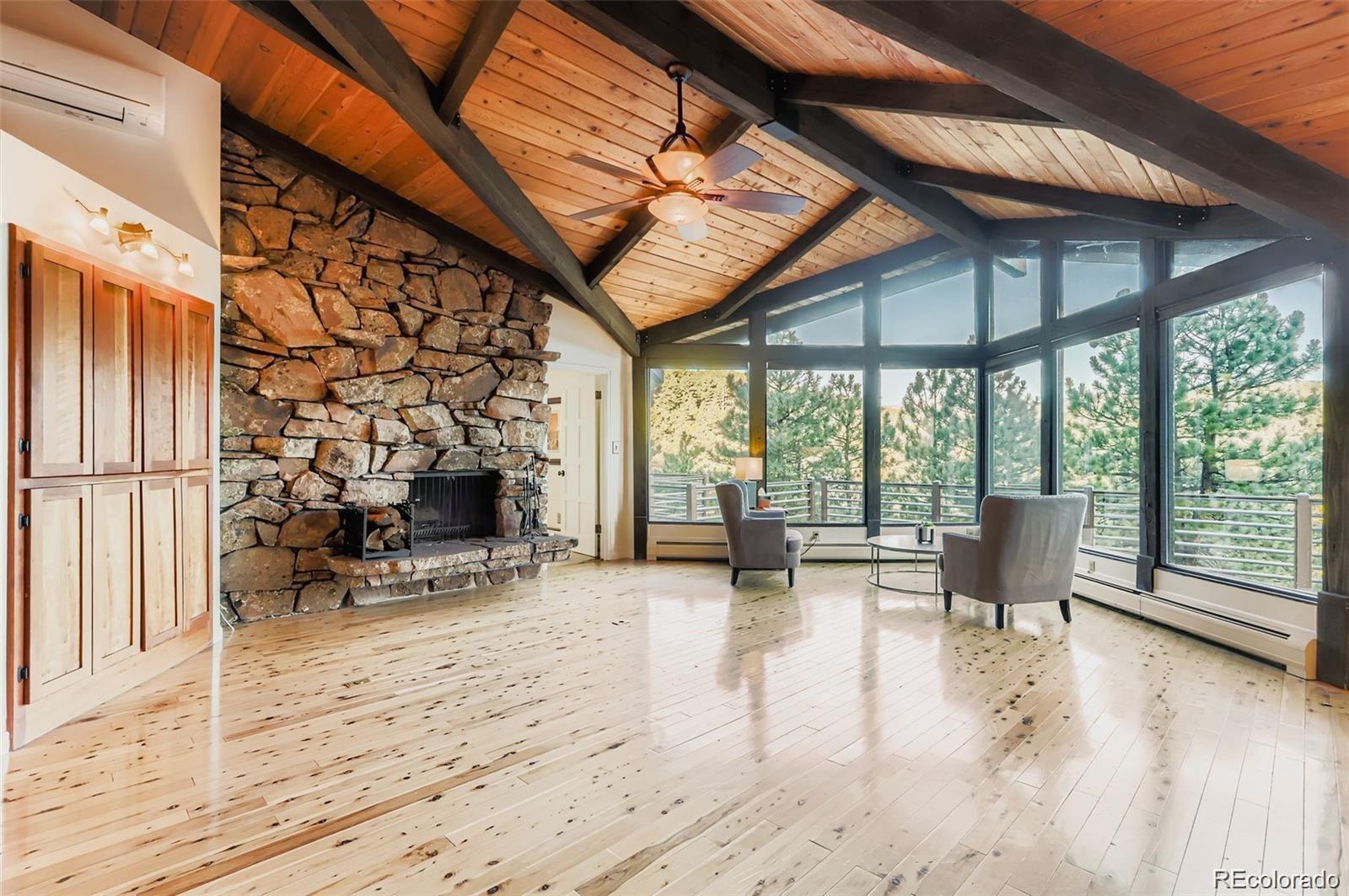 994 Timber Lane Boulder, CO 80304 - Photo 7 of 21 a view of a patio with a table and chairs