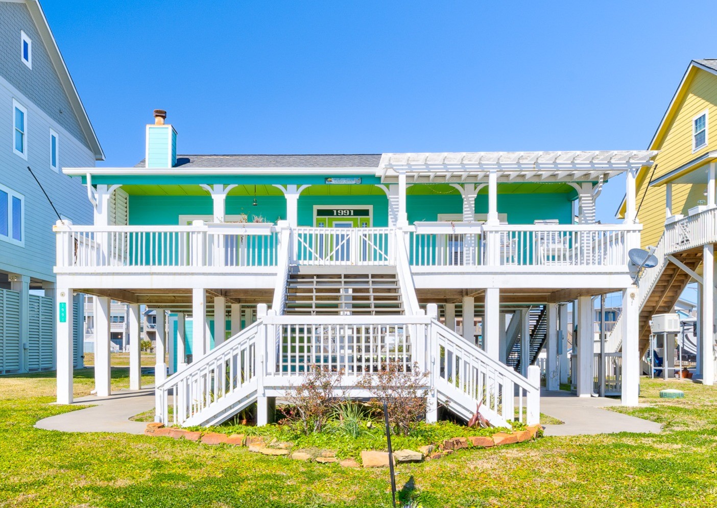 a front view of a house with a swimming pool
