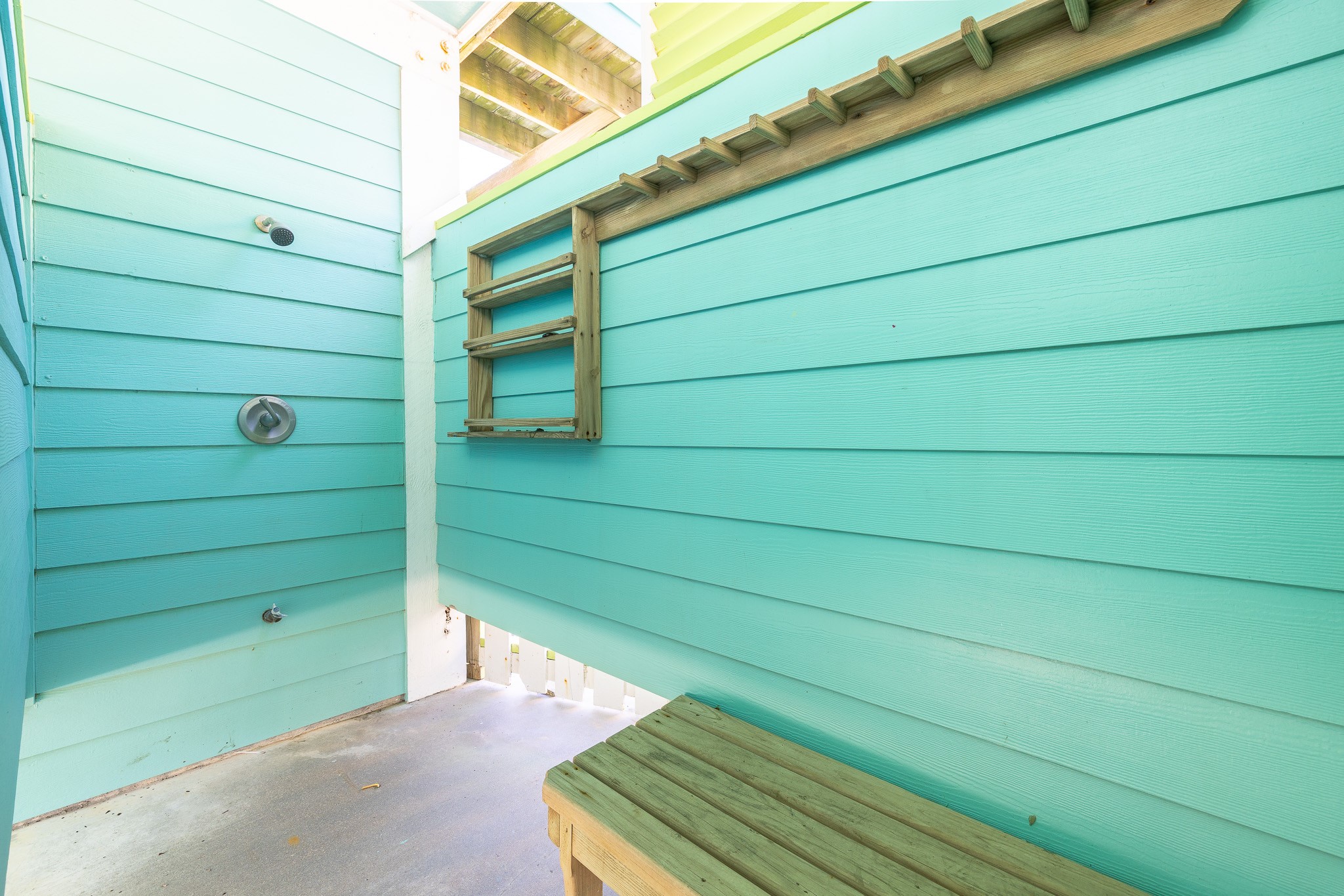 1991 Gulf Crystal Beach, TX 77650 - Photo 18 of 20 a green bench sitting in front of a window