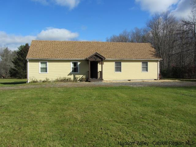 76 Tamarack Road Greenfield Park, NY 12435 - Photo 1 of 13 a view of a house with a big yard
