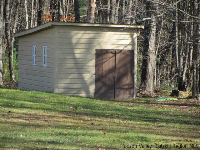 76 Tamarack Road Greenfield Park, NY 12435 - Photo 12 of 13 a view of house with yard