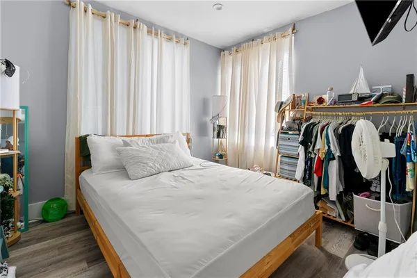 a bathroom with a sink a toilet and a shower
