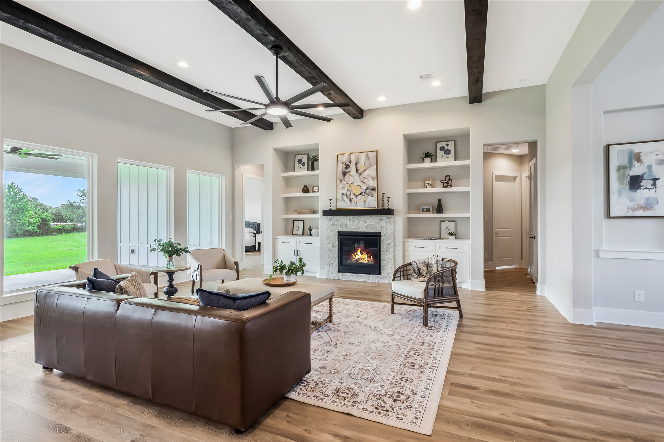 1404 Bluebonnet Ridge Drive Chappell Hill, TX 77426 - Photo 12 of 49 This inviting living room features an open layout perfect for entertaining.