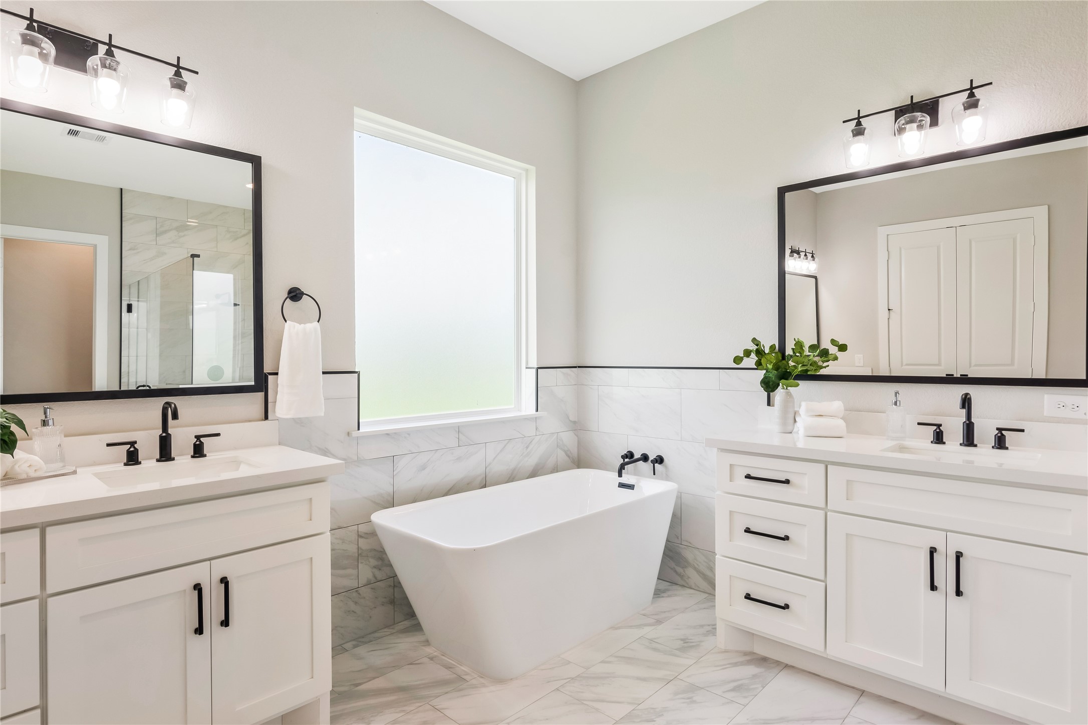 1404 Bluebonnet Ridge Drive Chappell Hill, TX 77426 - Photo 25 of 49 So much natural light, and stand-alone bathtub