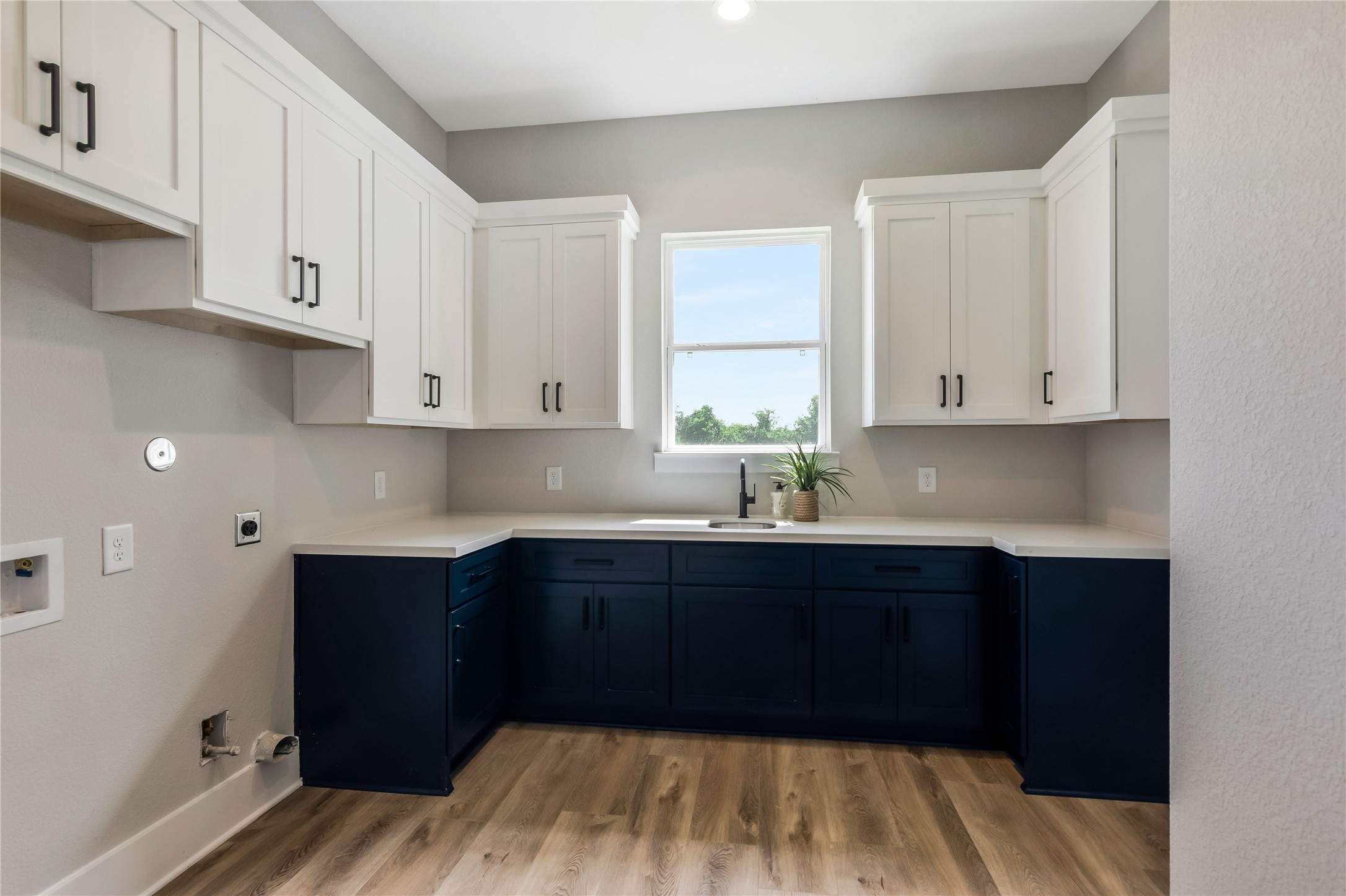 1404 Bluebonnet Ridge Drive Chappell Hill, TX 77426 - Photo 37 of 49 Expansive utility room with abundant storage solutions.