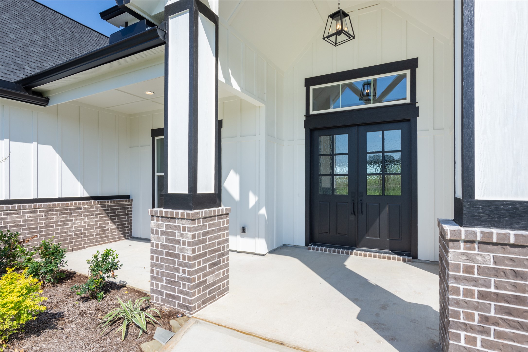 1404 Bluebonnet Ridge Drive Chappell Hill, TX 77426 - Photo 7 of 49 Welcoming front porch with elegant double doors.