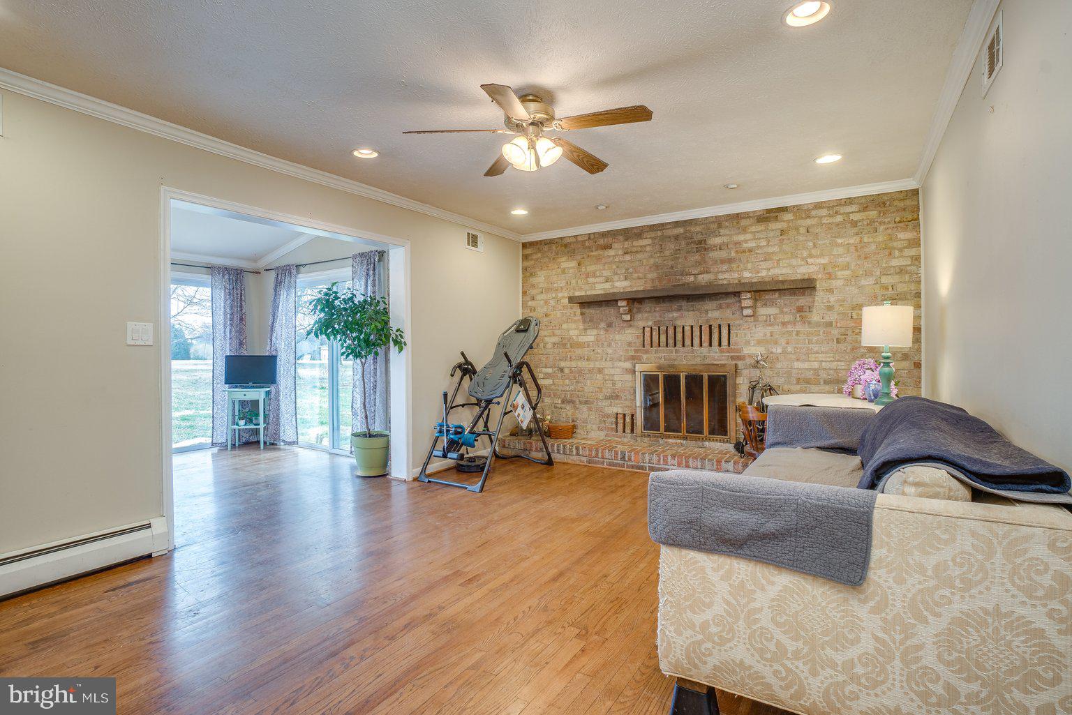 3837 Justin Road Monkton, MD 21111 - Photo 27 of 48 Family Room w/ brick wood burning fireplace