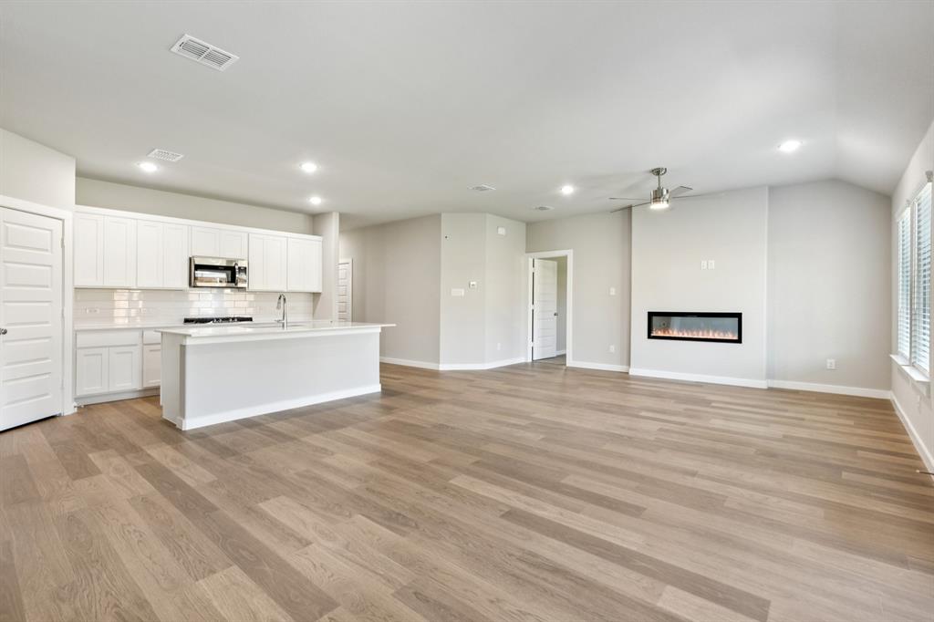 1417 Barbacoa Drive Haslet, TX 76052 - Photo 30 of 32 a view of kitchen with wooden floor