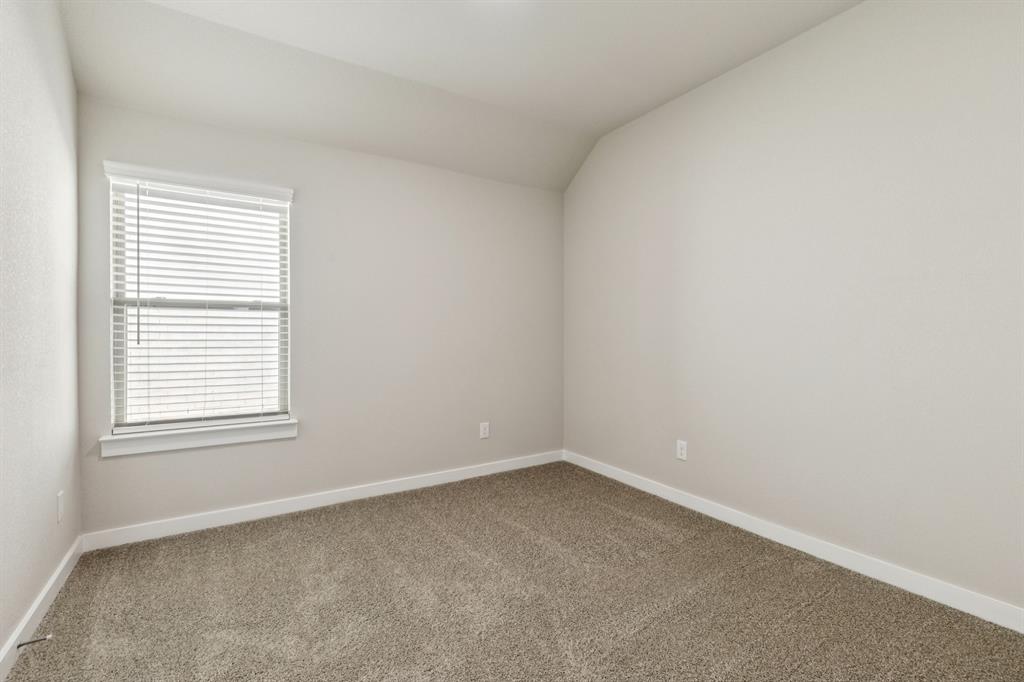 1417 Barbacoa Drive Haslet, TX 76052 - Photo 22 of 32 an empty room with a window