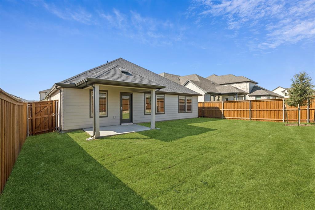 1417 Barbacoa Drive Haslet, TX 76052 - Photo 28 of 32 a front view of a house with a garden