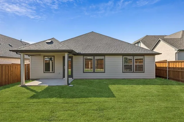 a view of hallway with wooden floor