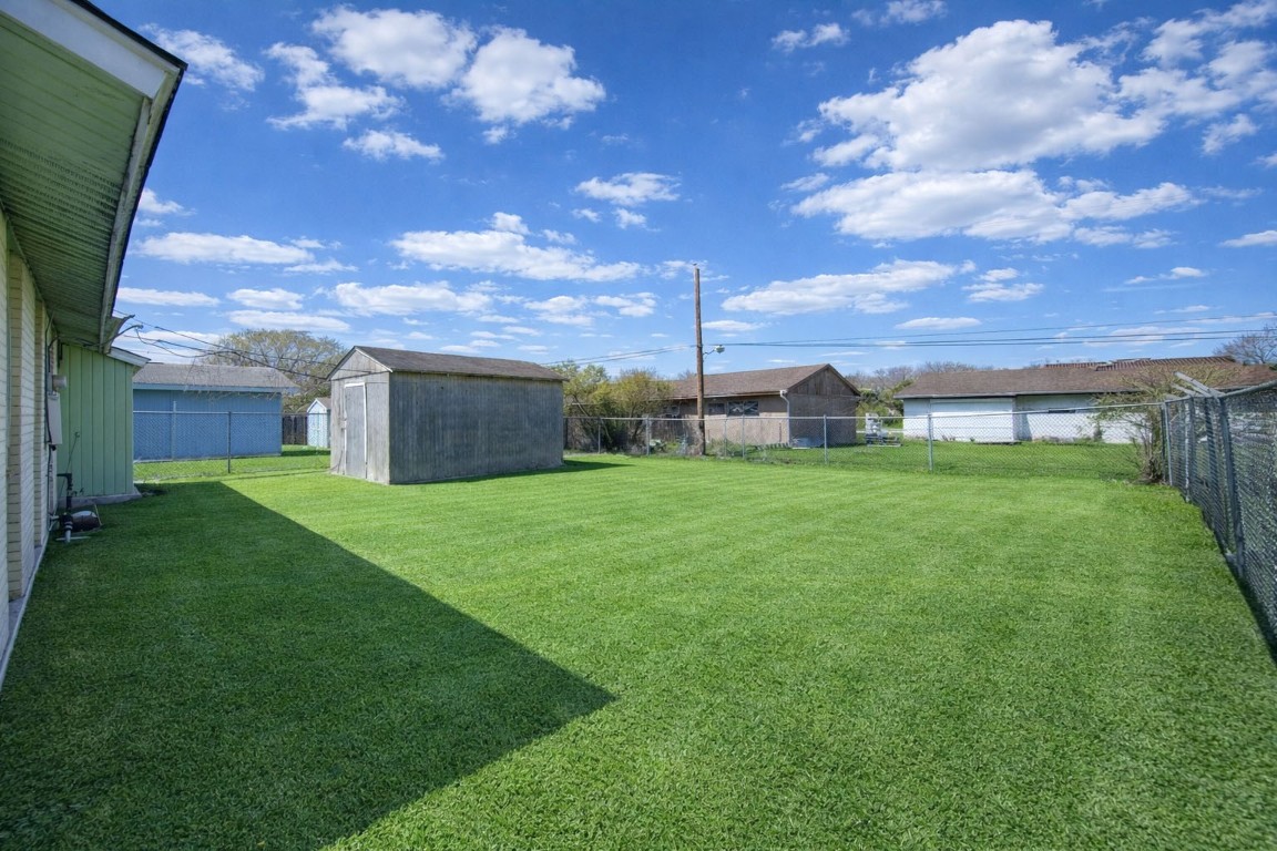 5223 Grace Point Lane Houston, TX 77048 - Photo 22 of 24 a view of a house with a back yard