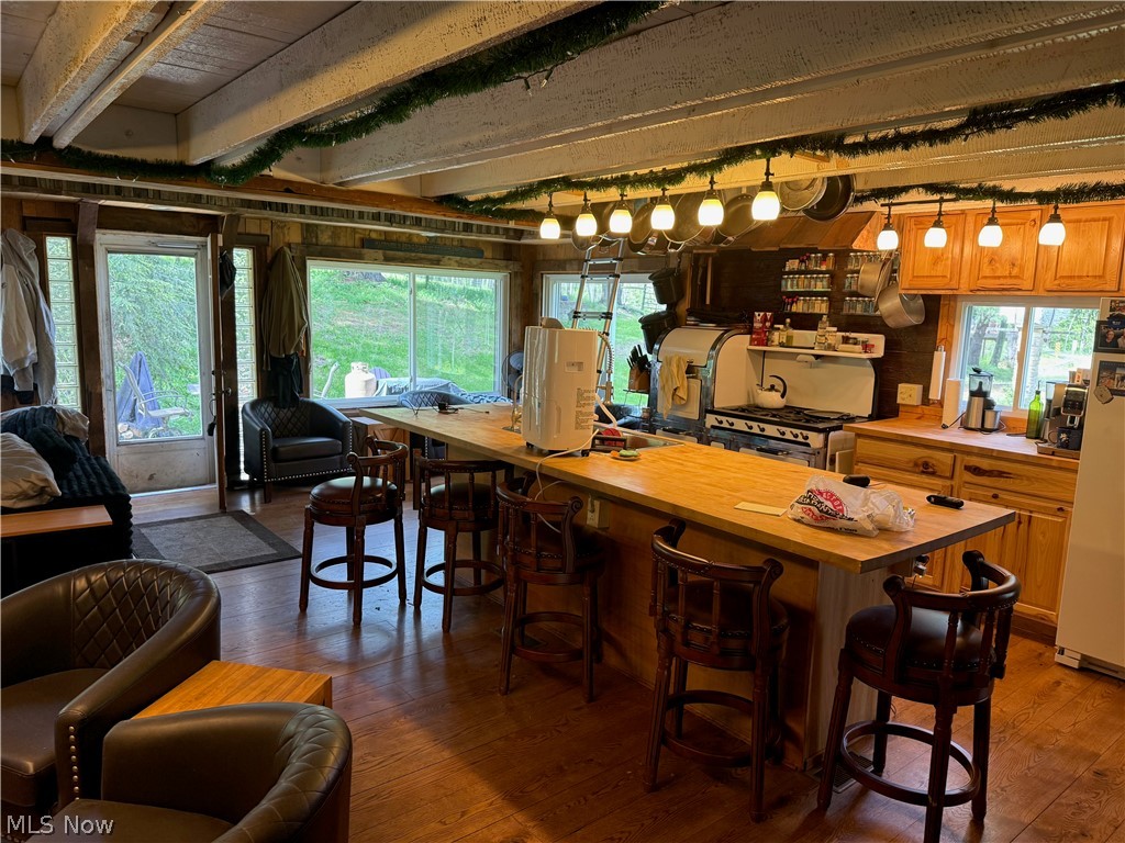 11811 Gaston Road Rogers, OH 44455 - Photo 28 of 38 Enjoy your time inside this cozy, functional, and equipped log cabin! You've already got the important utilities like electric, geo-thermal heat, a septic system installed 6 years ago, and private well water.