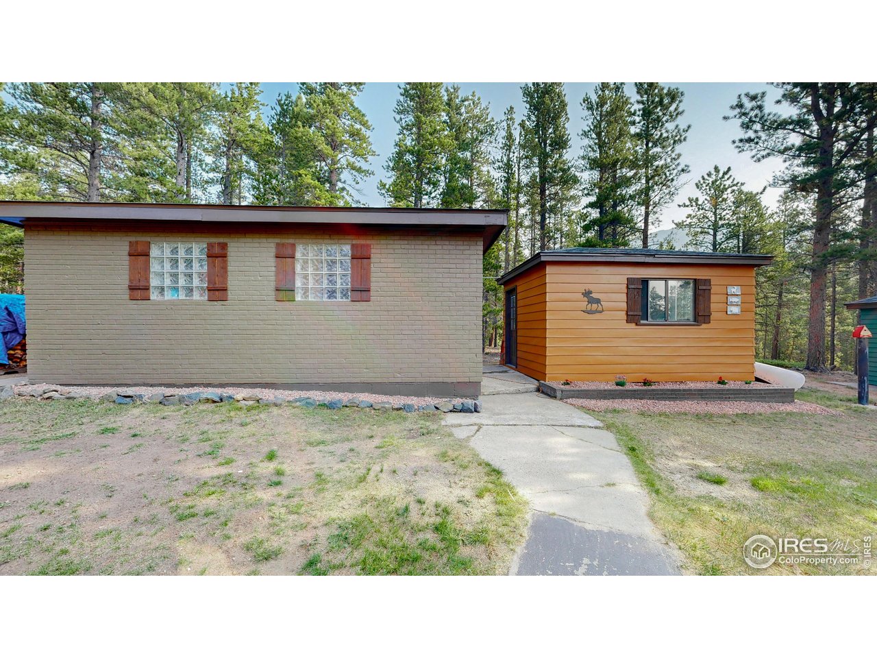 2420 Big Owl Road Allenspark, CO 80510 - Photo 13 of 26 Green Workshop Garage + Brown Moose Accessory Dwelling 1