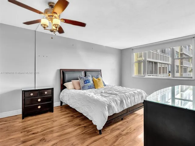 an aerial view of residential building and ocean